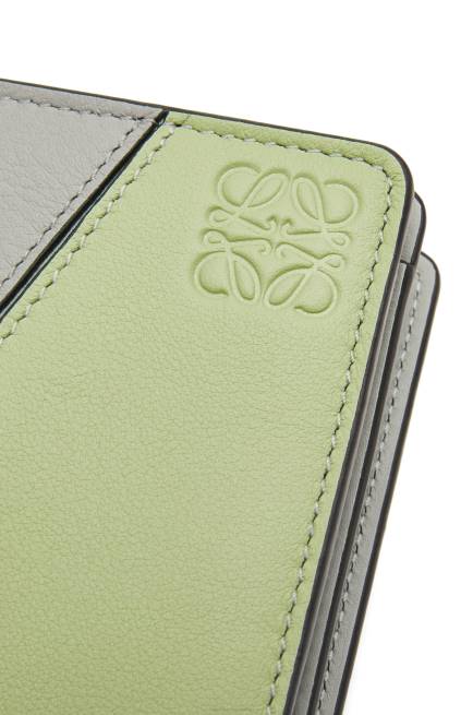Ash Grey/Light Celadon Puzzle compact zip wallet in classic calfskin Loewe 84PR1261 Women