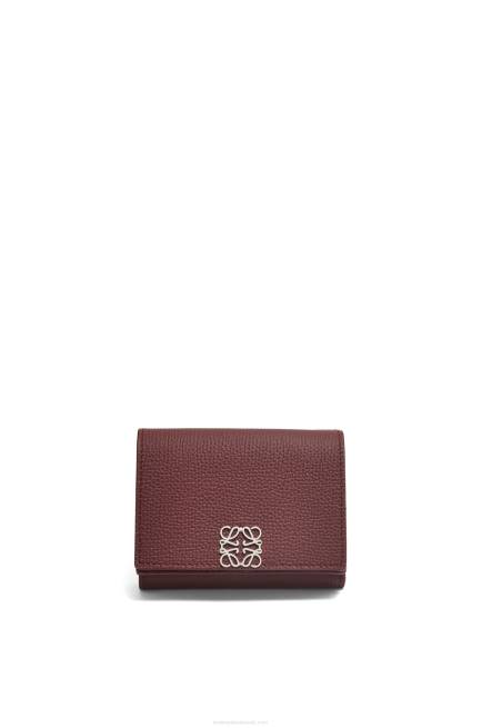 Burgundy Anagram trifold wallet in pebble grain calfskin Loewe 84PR1296 Women