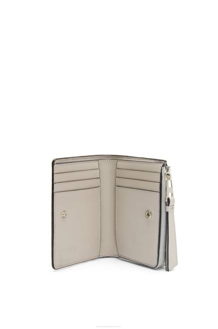 Ghost/Peach Bloom Puzzle slim bifold wallet in classic calf Loewe 84PR1263 Women