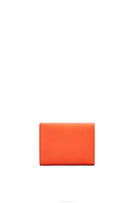 Orange Anagram trifold wallet in pebble grain calfskin Loewe 84PR1293 Women